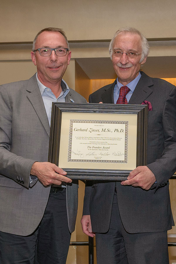 Dr. Gerhard Zinser (right) receives the Founders’ Award from Dr. John Flanagan, one of the founders of the Optometric Glaucoma Society. Photo: Andie Petkus Photography.